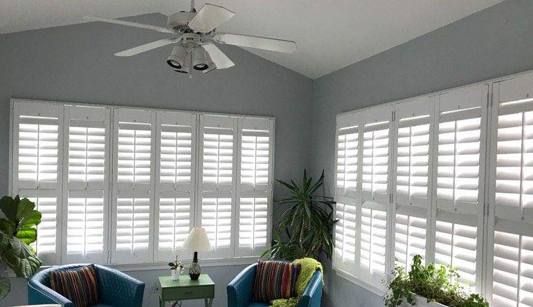 Raleigh sunroom with fan and shutters